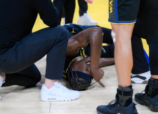 Jimmy Butler suffers apparent serious knee injury: Warriors star helped to locker room during game Jimmy Butler suffers apparent serious knee injury: Warriors star helped to locker room during game