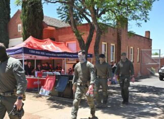 Police widen search for triple murder suspect, flag possibility others may be helping him Police widen search for triple murder suspect, flag possibility others may be helping him