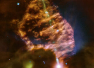 Glowing Nebula Turns Out to Be Stellar Cradle Glowing Nebula Turns Out to Be Stellar Cradle
