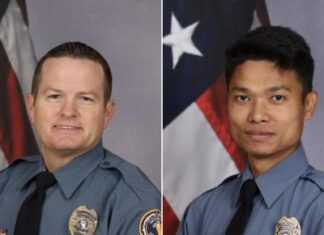 One officer killed, another wounded in suburban Atlanta hotel shooting One officer killed, another wounded in suburban Atlanta hotel shooting